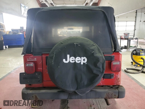 2004 Jeep Wrangler Sport with VIN 1J4FA49S54P758930, listed as a Copart auction lot 53949665 with 190,457 mi miles and Clean title. Bid and sale history available at DreamBid. Image 6.
