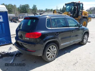 2012 Volkswagen Tiguan SEL with VIN WVGAV7AX2CW529232, listed as a IAAI auction lot 41955121 with 164,885 mi miles and . Bid and sale history available at DreamBid. Image 4.