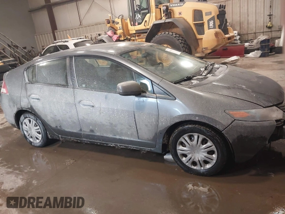 2011 Honda Insight with VIN JHMZE2H37BS004281, listed as a IAAI auction lot 41636305 with 273,063 mi miles and . Bid and sale history available at DreamBid. Image 14.