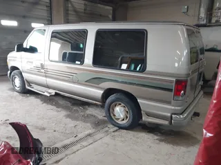 2002 Ford Econoline Cargo Recreational with VIN 1FDRE14L22HB53224, listed as a IAAI auction lot 41967017 with 202,065 mi miles. Bid and sale history available at carsss.com. Image 3.