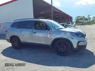 2022 Honda Pilot Special Edition with VIN 5FNYF5H25NB034822, listed as a IAAI auction lot 40341057 with 25,931 mi miles and . Bid and sale history available at DreamBid. Image 13.