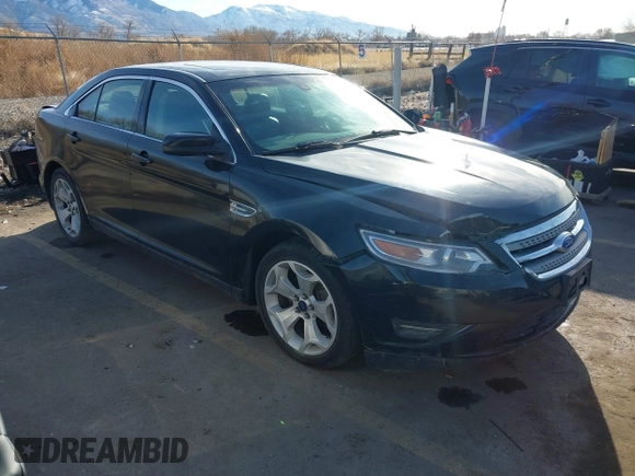 2012 Ford Taurus SEL z VIN 1FAHP2EW3CG128208, wystawiony jako IAAI lot #41020348 z przebiegiem 161 794 mil mil oraz . Historia ofert i sprzedaży dostępna na DreamBid. Obrazek 1.