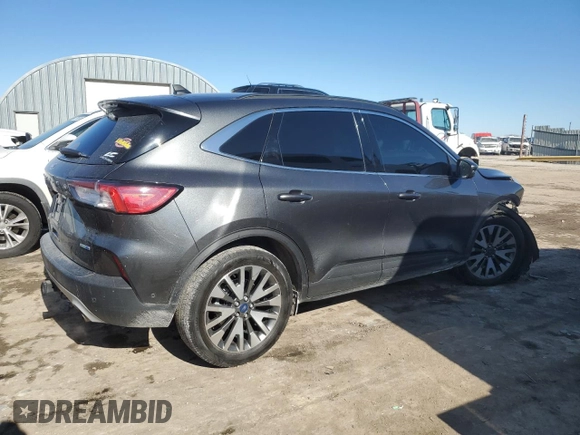 2020 Ford Escape Titanium with VIN 1FMCU9J92LUB45598, listed as a Copart auction lot 42088215 with 65,578 mi miles and Salvage title. Bid and sale history available at DreamBid. Image 3.