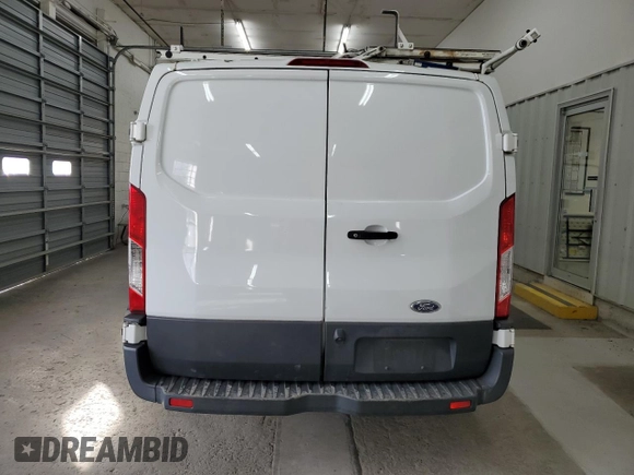 2018 Ford Transit z VIN 1FTYE1YM6JKB51903, wystawiony jako Copart lot #82398944 z przebiegiem 94 321 mil mil oraz Czysty tytuł • Clean title. Historia ofert i sprzedaży dostępna na DreamBid. Obrazek 6.