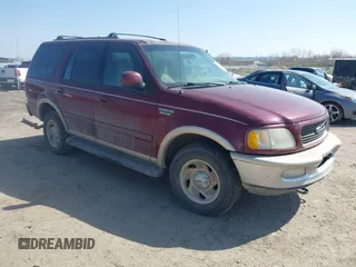 1998 Ford Expedition XLT z VIN 1FMPU18L0WLB53634, wystawiony jako IAAI lot #41895376 z przebiegiem 223 475 mil mil oraz . Historia ofert i sprzedaży dostępna na DreamBid. Obrazek 1.