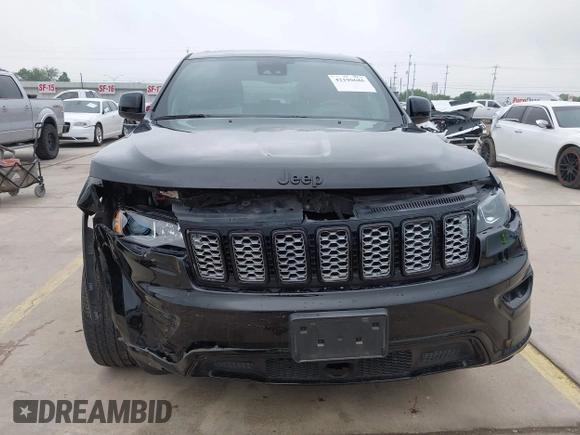 2021 Jeep Grand Cherokee Laredo X with VIN 1C4RJEAG8MC714539, listed as a IAAI auction lot 42190686 with 59,359 mi miles and . Bid and sale history available at DreamBid. Image 12.
