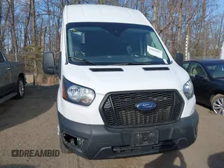 2023 Ford Transit Cargo with VIN 1FTBR3U88PKB01785, listed as a IAAI auction lot 41681093 with 47,672 mi miles and . Bid and sale history available at DreamBid. Image 12.