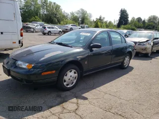 2000 Saturn SL z VIN 1G8ZG5287YZ109866, wystawiony jako Copart lot #64703644 z przebiegiem 146 163 mil mil oraz Tytuł czysty. Historia ofert i sprzedaży dostępna na DreamBid. Obrazek 1.