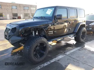 2018 Jeep Wrangler JK Unlimited Sport S with VIN 1C4BJWDG7JL818843, listed as a IAAI auction lot 41506058 with 43,563 mi miles. Bid and sale history available at carsss.com. Image 2.