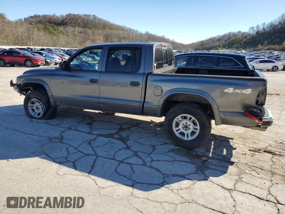 2004 Dodge Dakota Sport z VIN 1D7HG38K94S556894, wystawiony jako Copart lot #79743994 z przebiegiem 174 933 mil mil oraz Szkoda całkowita • Salvage title. Historia ofert i sprzedaży dostępna na DreamBid. Obrazek 2.