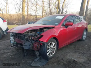 2016 Mazda Mazda3 i Sport with VIN 3MZBM1U70GM251972, listed as a IAAI auction lot 41772661 with 142,311 mi miles. Bid and sale history available at carsss.com. Image 6.