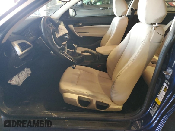 2015 BMW 2 Series 228i with VIN WBA1F5C54FVW98189, listed as a Copart auction lot 61815175 with 67,216 mi miles and Salvage title. Bid and sale history available at DreamBid. Image 7.