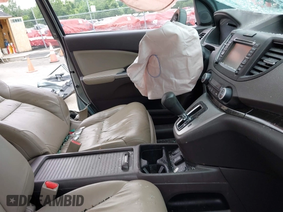 2012 Honda CR-V EX-L with VIN 2HKRM4H78CH601054, listed as a IAAI auction lot 42444157 with 113,491 mi miles and . Bid and sale history available at DreamBid. Image 5.