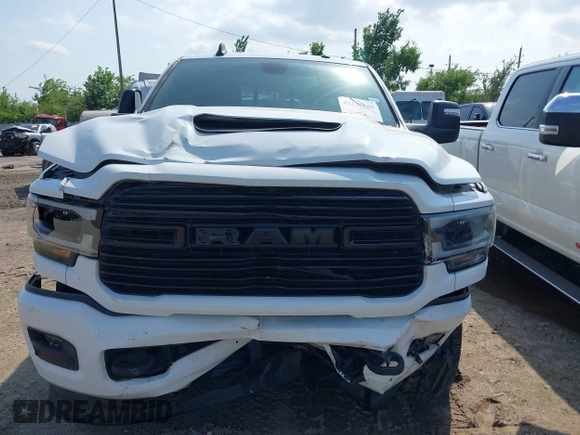 2023 Ram 2500 Laramie with VIN 3C6UR5FL3PG517960, listed as a IAAI auction lot 42128355 with 101,733 mi miles and . Bid and sale history available at DreamBid. Image 12.