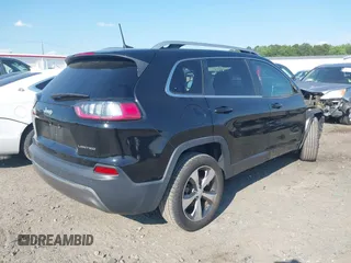 2019 Jeep Cherokee Limited z VIN 1C4PJLDB9KD266654, wystawiony jako IAAI lot #42201832 z przebiegiem 91 326 mil mil oraz . Historia ofert i sprzedaży dostępna na DreamBid. Obrazek 4.