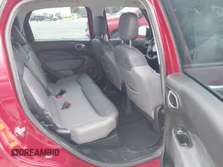 2014 FIAT 500L Lounge with VIN ZFBCFACH1EZ008603, listed as a IAAI auction lot 41583042 with 92,209 mi miles and . Bid and sale history available at DreamBid. Image 8.