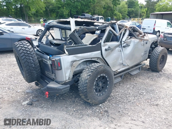 2017 Jeep Wrangler Unlimited Sport with VIN 1C4HJWDG6HL592265, listed as a IAAI auction lot 42335663 with 89,314 mi miles and . Bid and sale history available at DreamBid. Image 4.