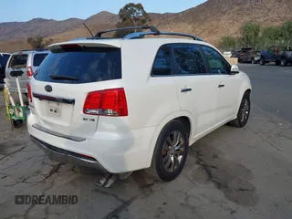 2012 Kia Sorento SX with VIN 5XYKW4A29CG224803, listed as a IAAI auction lot 41493527 with 228,065 mi miles. Bid and sale history available at carsss.com. Image 4.