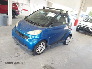 2008 Smart fortwo Pure with VIN WMEEJ31X28K123879, listed as a IAAI auction lot 42258663 with 93,056 mi miles and . Bid and sale history available at DreamBid. Image 2.