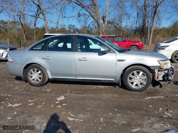 2009 Ford Taurus SE with VIN 1FAHP23WX9G120232, listed as a IAAI auction lot 41449199 with 162694 miles. Bid and sale history available at carsss.com. Image 13.