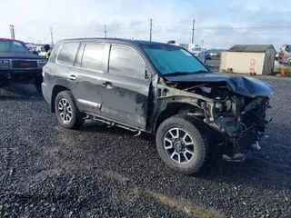 2013 Lexus LX 570 with VIN JTJHY7AXXD4128032, listed as a IAAI auction lot 41794039 with 125,431 mi miles and . Bid and sale history available at carsss.com. Image 1.