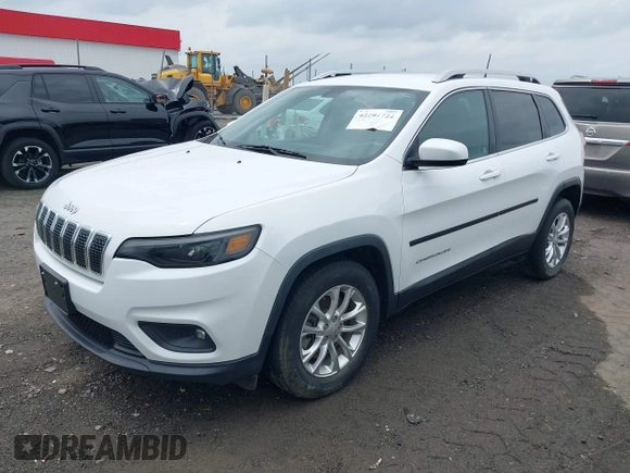 2019 Jeep Cherokee Latitude z VIN 1C4PJLCB8KD145129, wystawiony jako IAAI lot #42291722 z przebiegiem 89 155 mil mil oraz . Historia ofert i sprzedaży dostępna na DreamBid. Obrazek 2.
