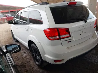 2019 Dodge Journey SE with VIN 3C4PDCBB7KT797842, listed as a IAAI auction lot 42036147 with 163,919 mi miles and . Bid and sale history available at DreamBid. Image 3.