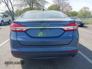 2018 Ford Fusion SE z VIN 3FA6P0H74JR176113, wystawiony jako IAAI lot #42074916 z przebiegiem 78 940 mil mil oraz . Historia ofert i sprzedaży dostępna na DreamBid. Obrazek 16.
