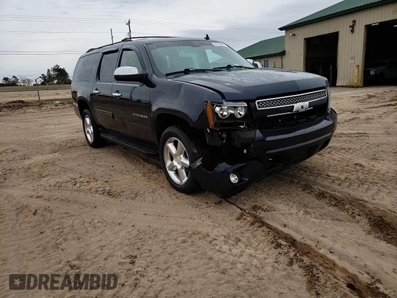 2013 Chevrolet Suburban LT with VIN 1GNSKJE75DR191647, listed as a Copart auction lot 54132905 with 127,916 mi miles and Clean title. Bid and sale history available at DreamBid. Image 14.