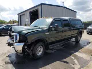 2001 Ford F-250 XL with VIN 1FTNW21F61EA33835, listed as a Copart auction lot 61712135 with 148,931 mi miles and Salvage title. Bid and sale history available at DreamBid. Image 1.