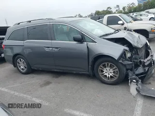 2012 Honda Odyssey EX-L с VIN 5FNRL5H65CB031318, выставлен на аукционе IAAI как лот 42371195 с пробегом 135 787 миль миль и . История ставок и продаж доступна на DreamBid. Изображение 13.
