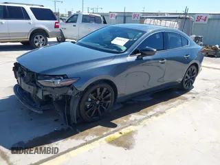 2022 Mazda 3 2.5 Turbo z VIN 3MZBPBAY8NM308426, wystawiony jako IAAI lot #41808563 z przebiegiem 44 693 mil mil oraz . Historia ofert i sprzedaży dostępna na DreamBid. Obrazek 2.