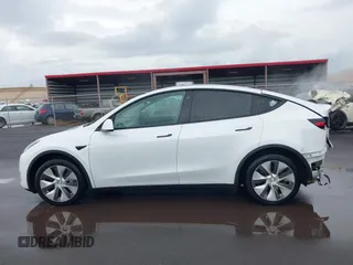 2020 Tesla Model Y Long Range z VIN 5YJYGDEE3LF043800, wystawiony jako IAAI lot #41590220 z przebiegiem 62 341 mil mil oraz . Historia ofert i sprzedaży dostępna na DreamBid. Obrazek 15.
