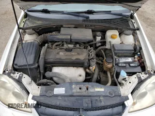 2008 Suzuki Forenza z VIN KL5JD86Z18K751692, wystawiony jako Copart lot #62879024 z przebiegiem 115 644 mil mil oraz Szkody całkowita. Historia ofert i sprzedaży dostępna na DreamBid. Obrazek 11.