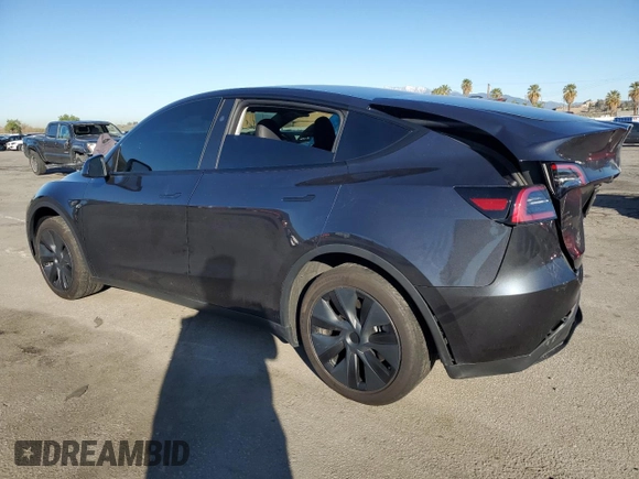 2024 Tesla Model Y with VIN 7SAYGDED7RF108604, listed as a Copart auction lot 48384825 with 24,603 mi miles and Salvage Title. Bid and sale history available at DreamBid. Image 2.