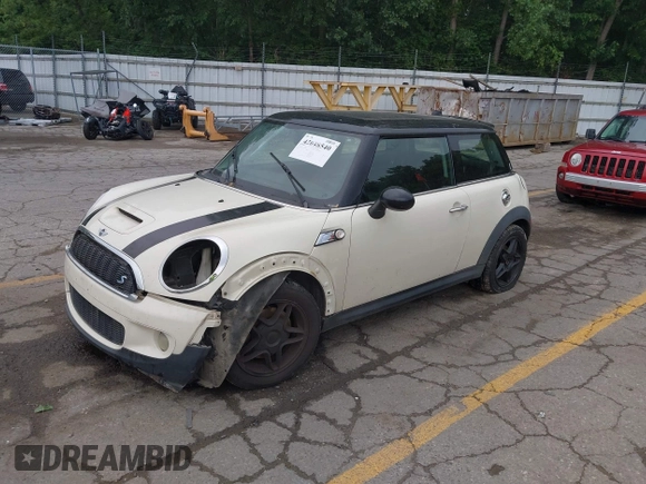 2007 MINI Hardtop S with VIN WMWMF73587TL87127, listed as a IAAI auction lot 42648540 with Not provided miles and . Bid and sale history available at DreamBid. Image 2.