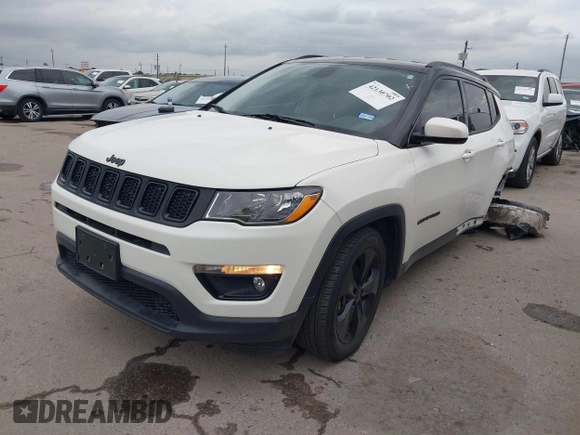 2020 Jeep Compass Latitude z VIN 3C4NJCBB3LT211543, wystawiony jako IAAI lot #42130702 z przebiegiem 70 227 mil mil oraz . Historia ofert i sprzedaży dostępna na DreamBid. Obrazek 19.