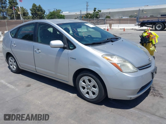 2008 Toyota Prius z VIN JTDKB20U183378002, wystawiony jako IAAI lot #42408794 z przebiegiem 227 839 mil mil oraz . Historia ofert i sprzedaży dostępna na DreamBid. Obrazek 1.
