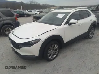 2021 Mazda CX-30 Premium with VIN 3MVDMADL5MM318729, listed as a IAAI auction lot 41645560 with 51,132 mi miles and . Bid and sale history available at DreamBid. Image 18.