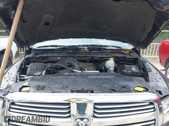 2015 Ram 1500 SLT z VIN 1C6RR6GT7FS742111, wystawiony jako IAAI lot #42469927 z przebiegiem 111 130 mil mil oraz . Historia ofert i sprzedaży dostępna na DreamBid. Obrazek 10.