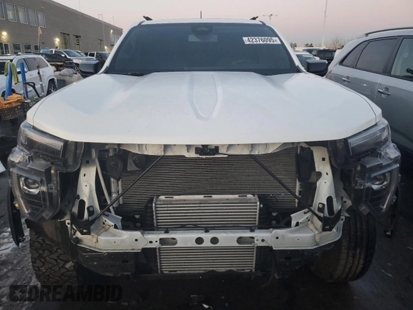 2023 GMC Canyon 4WD AT4 with VIN 1GTP6DEK4P1180070, listed as a Copart auction lot 42376095 with 26,892 mi miles and Salvage Title. Bid and sale history available at carsss.com. Image 5.