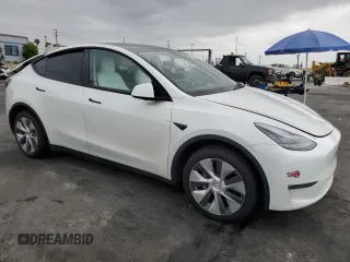 2021 Tesla Model Y Long Range with VIN 5YJYGDEEXMF151686, listed as a Copart auction lot 53903115 with 65,321 mi miles and Salvage Title. Bid and sale history available at DreamBid. Image 4.