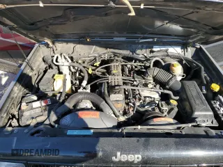 2001 Jeep Cherokee Sport z VIN 1J4FF58S61L612533, wystawiony jako Copart lot #76824714 z przebiegiem 62 401 mil mil oraz Szkoda całkowita • Salvage title. Historia ofert i sprzedaży dostępna na DreamBid. Obrazek 11.