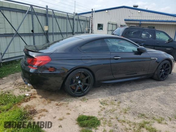 2014 BMW M6 z VIN WBSLX9C54ED160430, wystawiony jako Copart lot #66270794 z przebiegiem 92 025 mil mil oraz Szkoda całkowita • Salvage title. Historia ofert i sprzedaży dostępna na DreamBid. Obrazek 3.