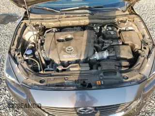 2018 Mazda 3 Touring z VIN 3MZBN1L33JM235106, wystawiony jako Copart lot #58272365 z przebiegiem 28 844 mil mil oraz Szkoda całkowita • Salvage title. Historia ofert i sprzedaży dostępna na DreamBid. Obrazek 12.
