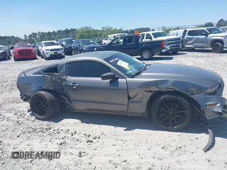 2014 Ford Mustang V6 with VIN 1ZVBP8AM1E5218928, listed as a IAAI auction lot 42039119 with 159,700 mi miles. Bid and sale history available at carsss.com. Image 13.