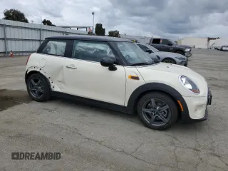 2016 MINI Hardtop with VIN WMWXP5C52G2D13922, listed as a Copart auction lot 54707815 with 47,625 mi miles and Salvage title. Bid and sale history available at DreamBid. Image 4.