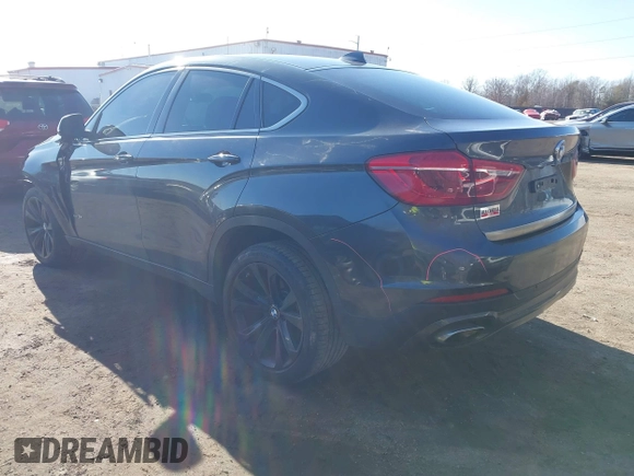 2019 BMW X6 xDrive35i z VIN 5UXKU2C51K0Z64589, wystawiony jako IAAI lot #41537380 z przebiegiem 60 769 mil mil oraz . Historia ofert i sprzedaży dostępna na DreamBid. Obrazek 3.