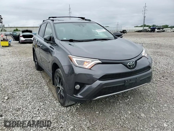 2018 Toyota RAV4 SE with VIN JTMJFREV2JJ730077, listed as a Copart auction lot 56666055 with 85,100 mi miles and Salvage title. Bid and sale history available at DreamBid. Image 14.