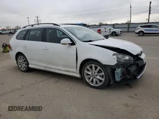 2014 Volkswagen Jetta SportWagen TDI w/Sunroof & Nav with VIN 3VWPL7AJ3EM618727, listed as a Copart auction lot 48531305 with 136,930 mi miles and Salvage Title. Bid and sale history available at carsss.com. Image 4.
